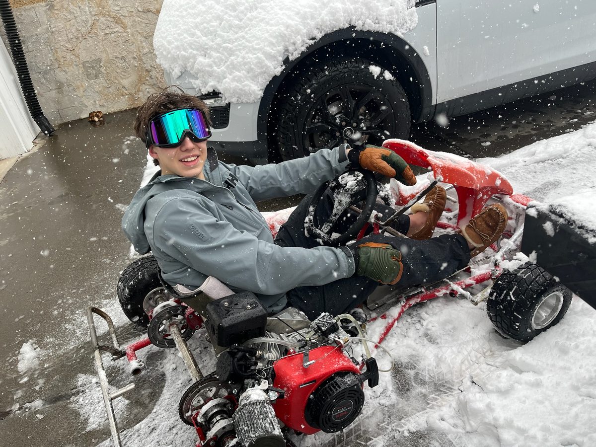 Carter on a go-kart in the snow
